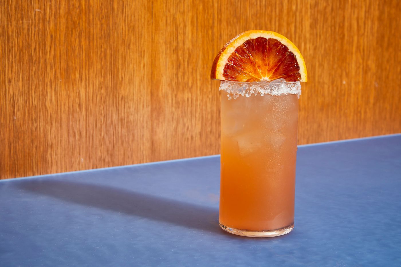 The Blood Orange Paloma gives the classic cocktail a sweeter citrus twist