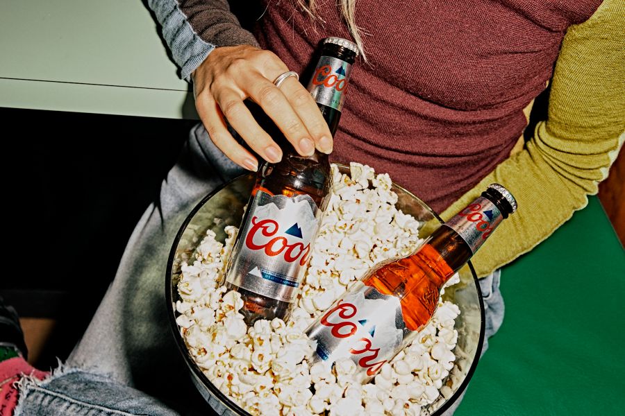 Bottles of Coors Lager with popcorn