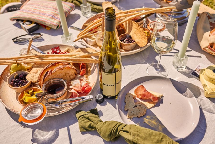 Food and wine on a table al fresco