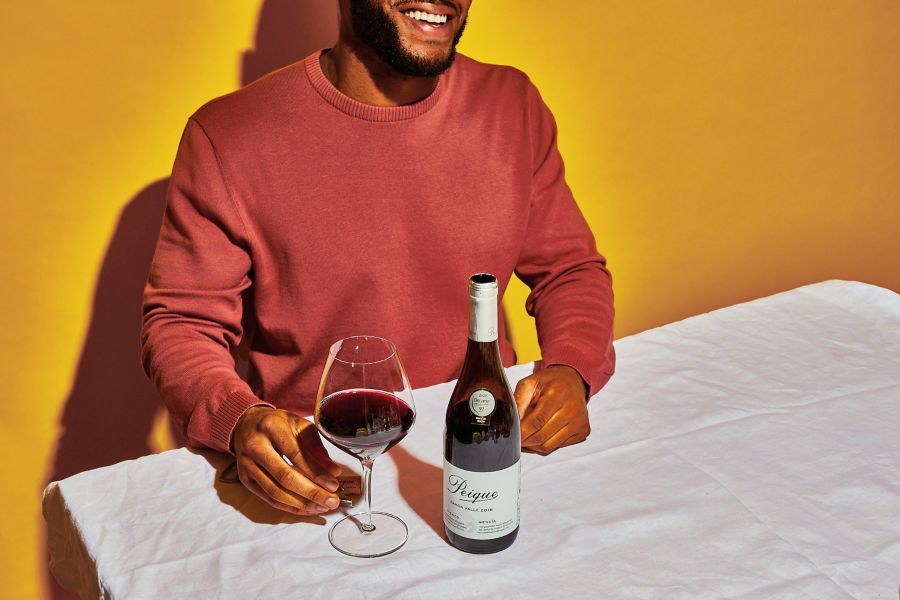 At the table with a bottle of the Peique Ramon Valle Mencia  