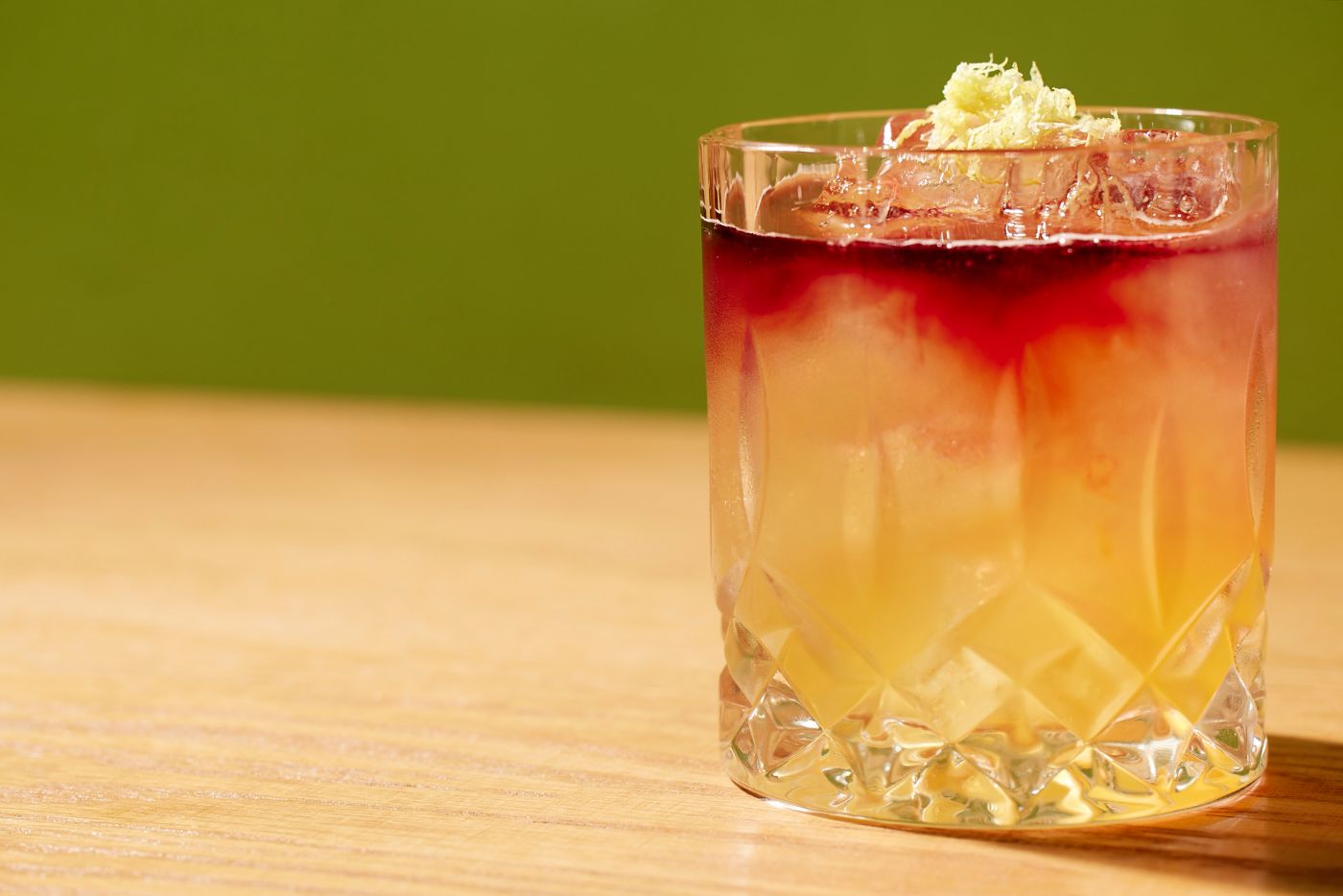The New York Sour cocktail has a red-wine float on top