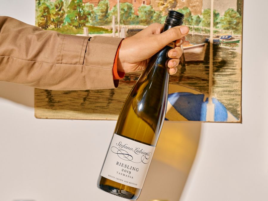 Holding a bottle of the Stefano Lubiana Riesling