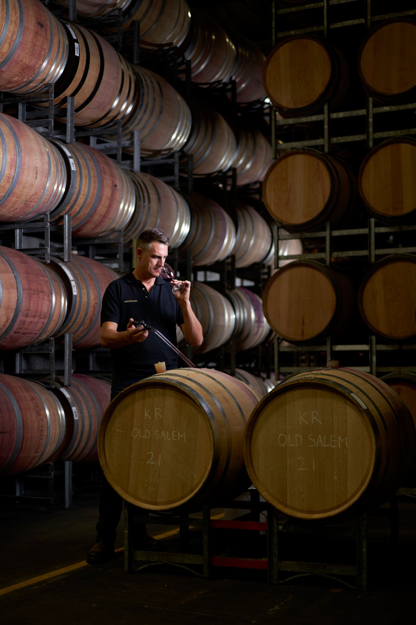 Krondorf winemaker Nick Badrice in the barrel room at the winery 