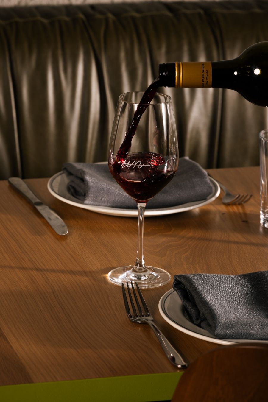 Red wine being poured at Untitled Bar