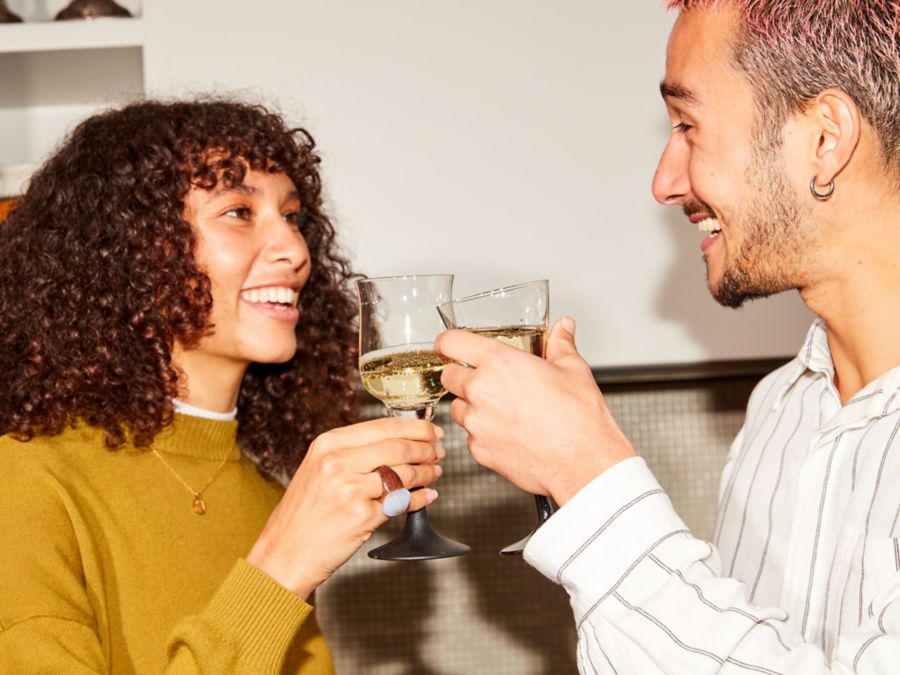 Picnic setting with a cheese board and cans of Liberty Coast Raspberry