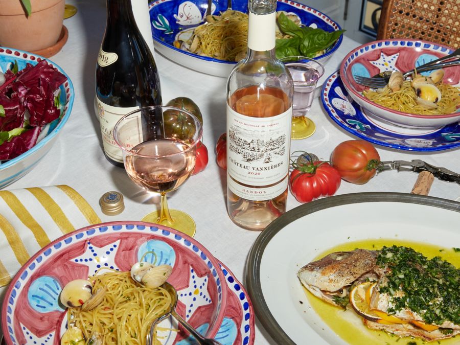 Table with pasta and wine