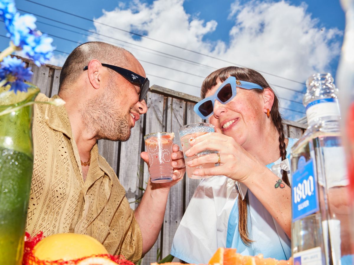 Raph and Beci drinking Palomas in the sun