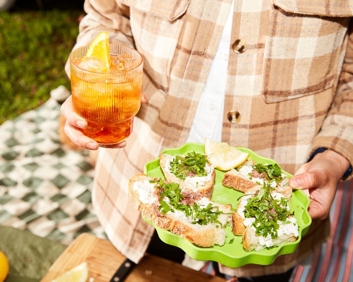 Cynar drink and achnovy toast snack