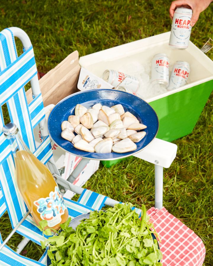 A bowl of pippis and esky of Heaps Normal beers