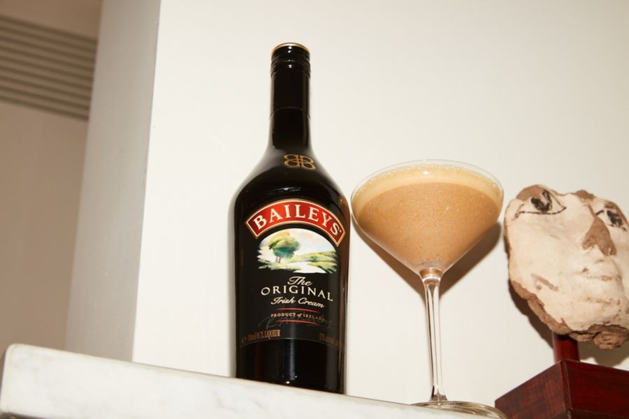 Bottle of baileys and drink glass