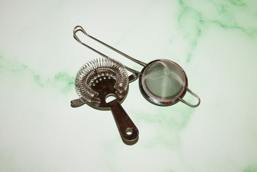 Cocktail strainers includnig a Hawthorne strainer and fine mesh strainer
