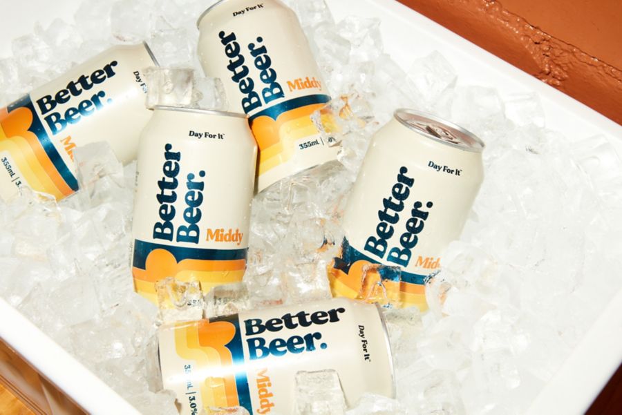 Cans of Better Beer Middy in an esky with ice