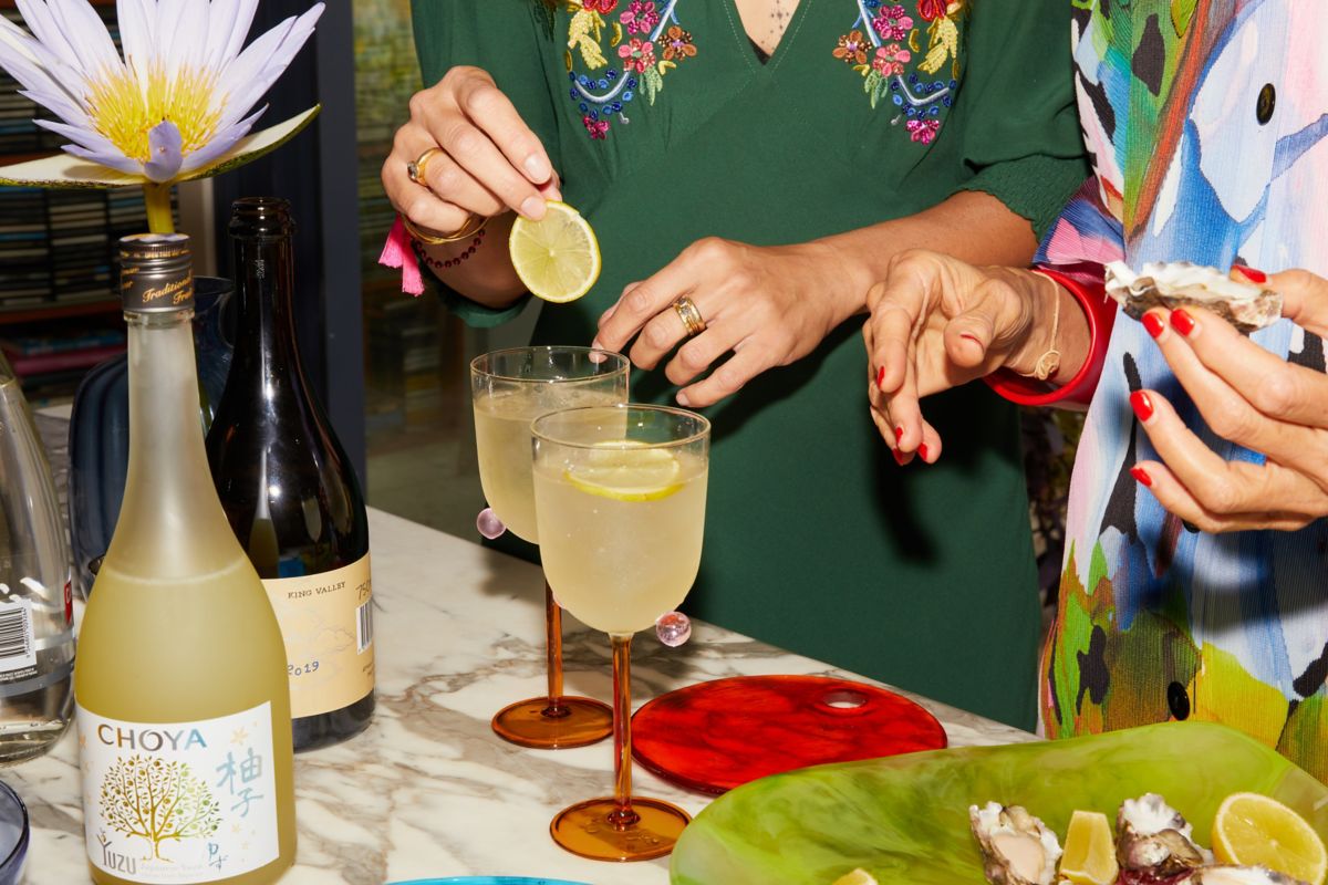 Grace mixing a Yuzu spritz