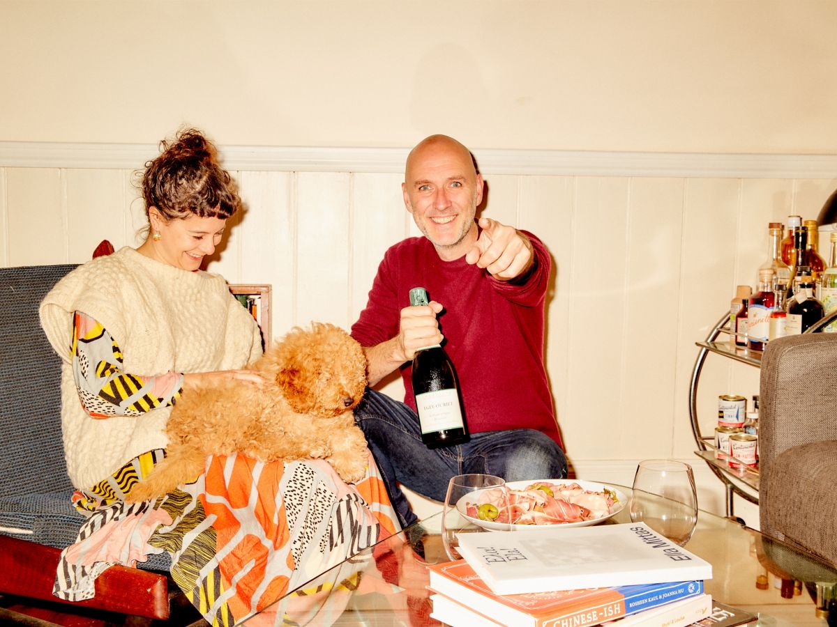 Pat Nourse and Helena Rosebery opening Champagne with cured meat platter