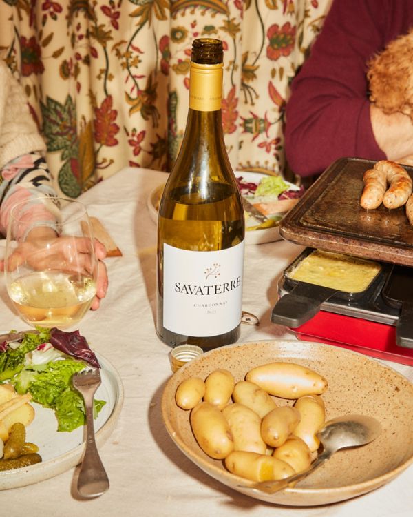 Savaterre Chardonnay on table with potatoes and raclette