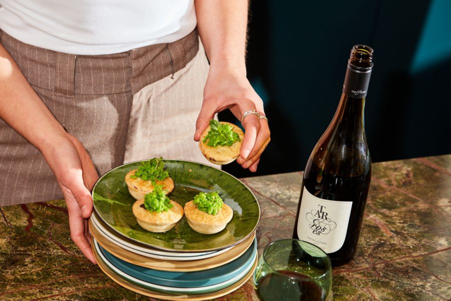 Party pies with mushy peas and mint, served with Tar & Roses Sangiovese