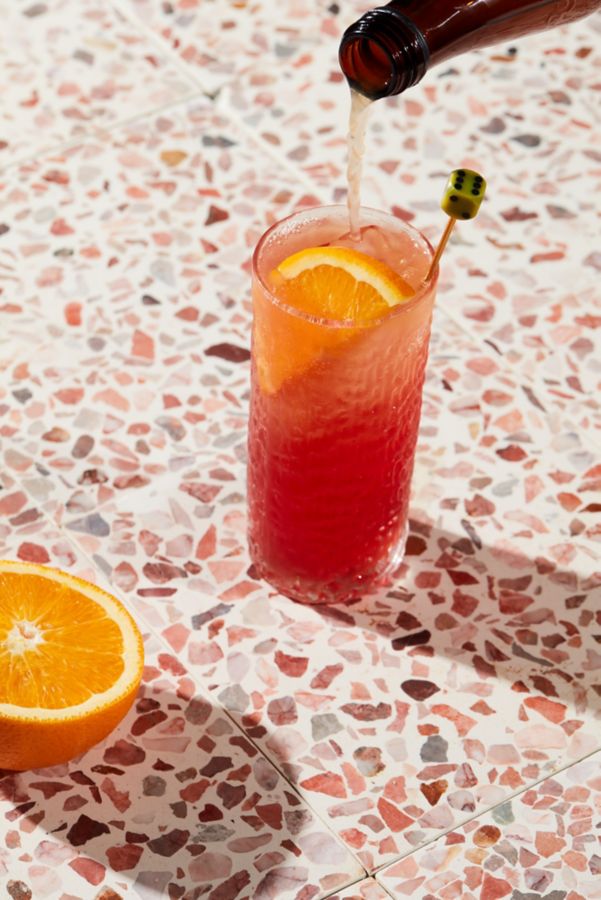 Kombucha Sbagliato cocktail being poured