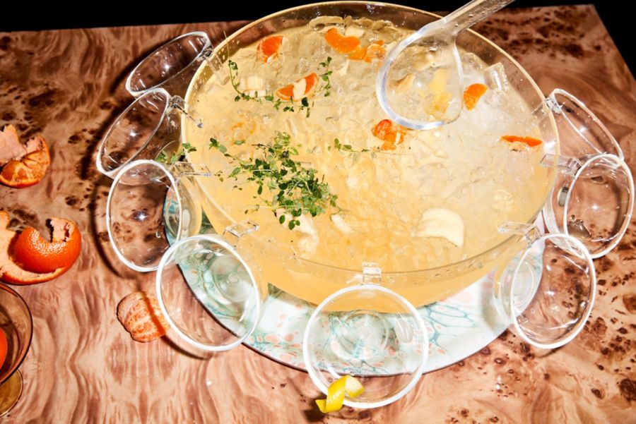 The White Mandarin Sangria served in a traditional punch bowl 