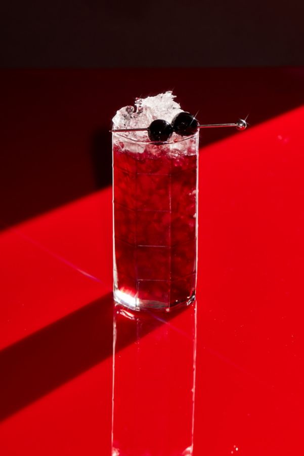 A refreshing glass of Cherry Christmas Spritz cocktail