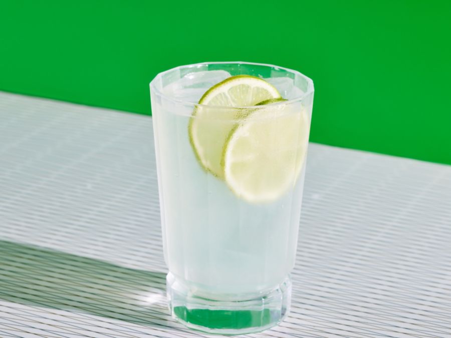 The Ranch Water Cocktail in a highball glass with lime wheel garnish