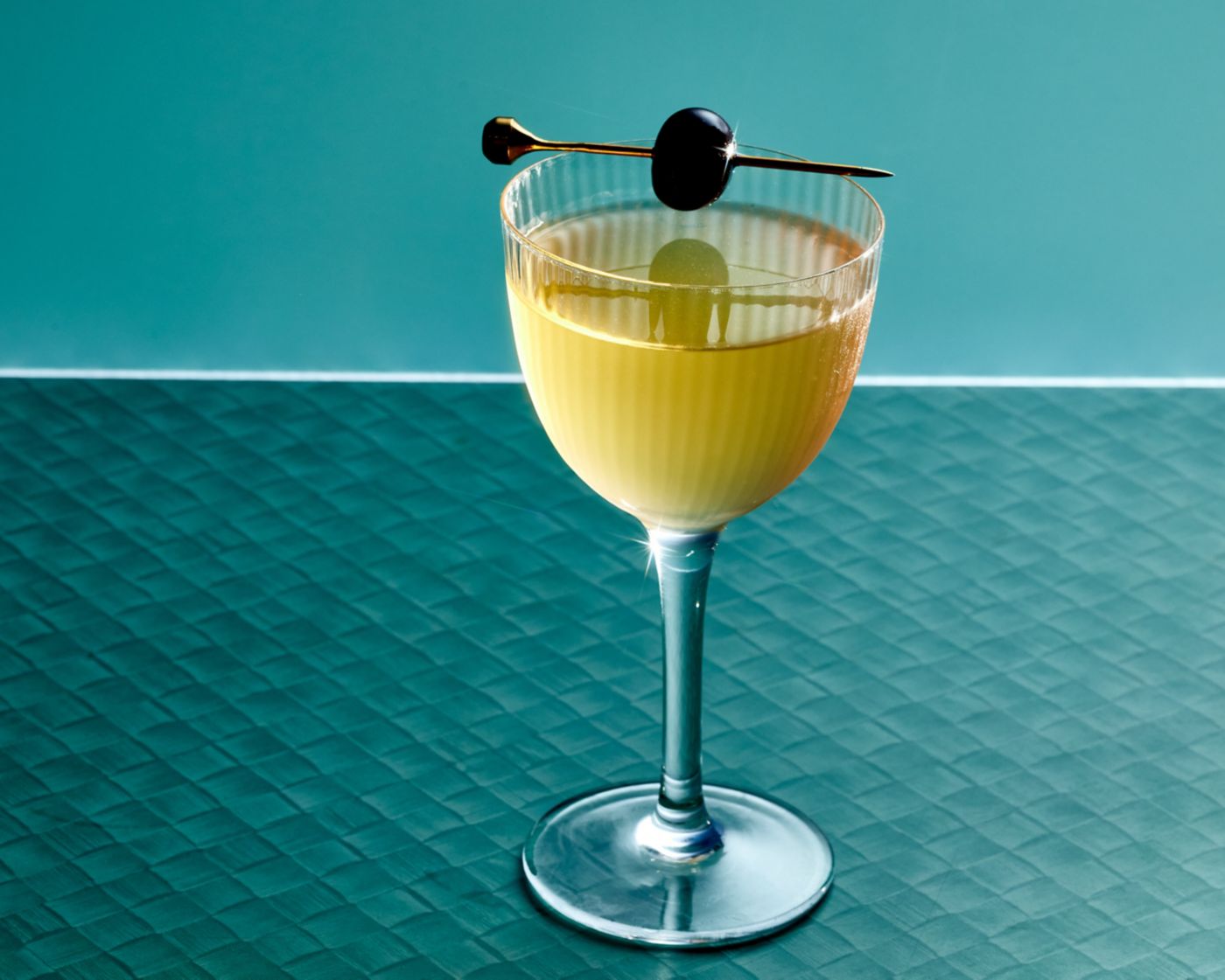 The Bijou cocktail blends gin, sweet vermouth and Chartreuse