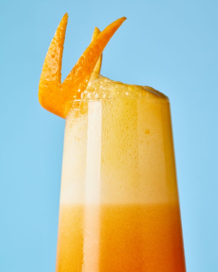 The Amaretto Fizz, finished with orange zest 