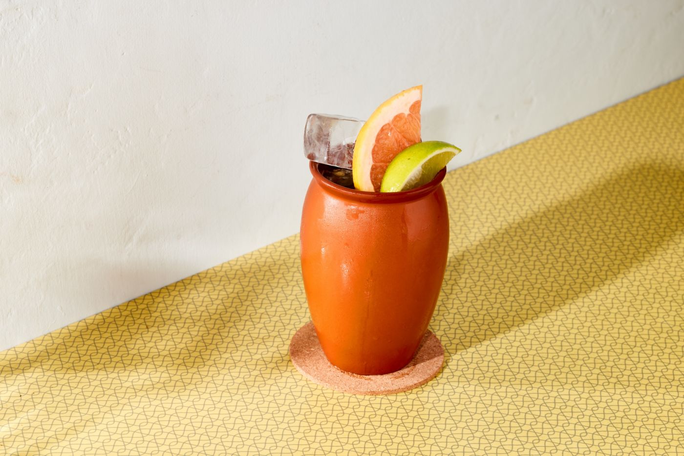 The Cantarito is in a traditional Mexican clay cup 