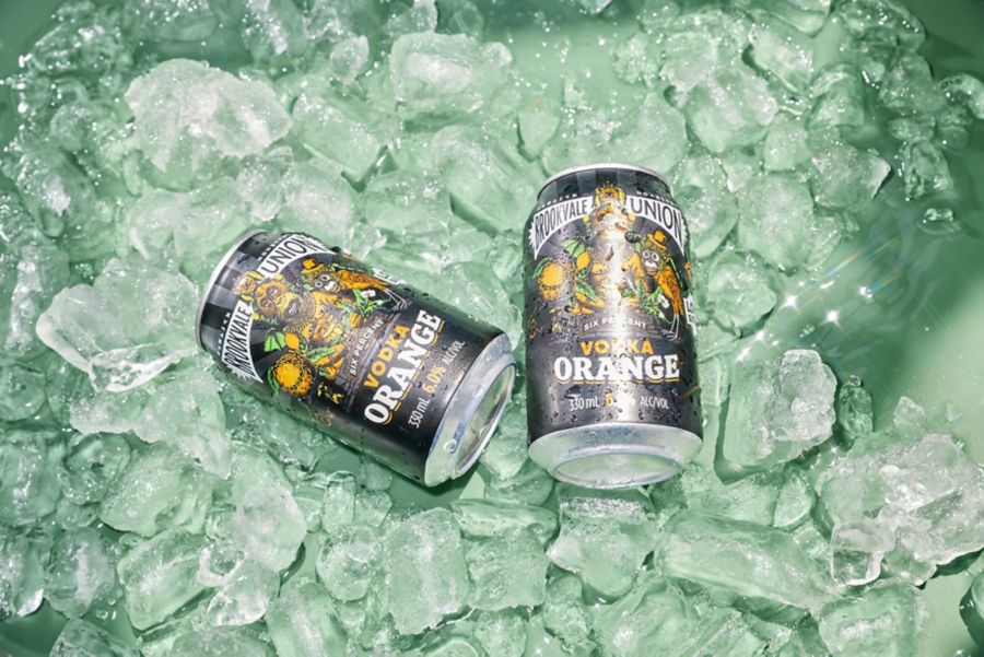 Cans of Brookvale Union Vodka Orange on ice