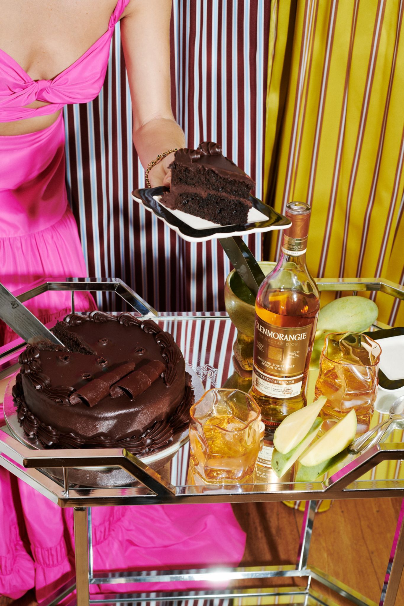 Nadia serving chocolate birthday cake with Glenmorangie Scotch Whisky