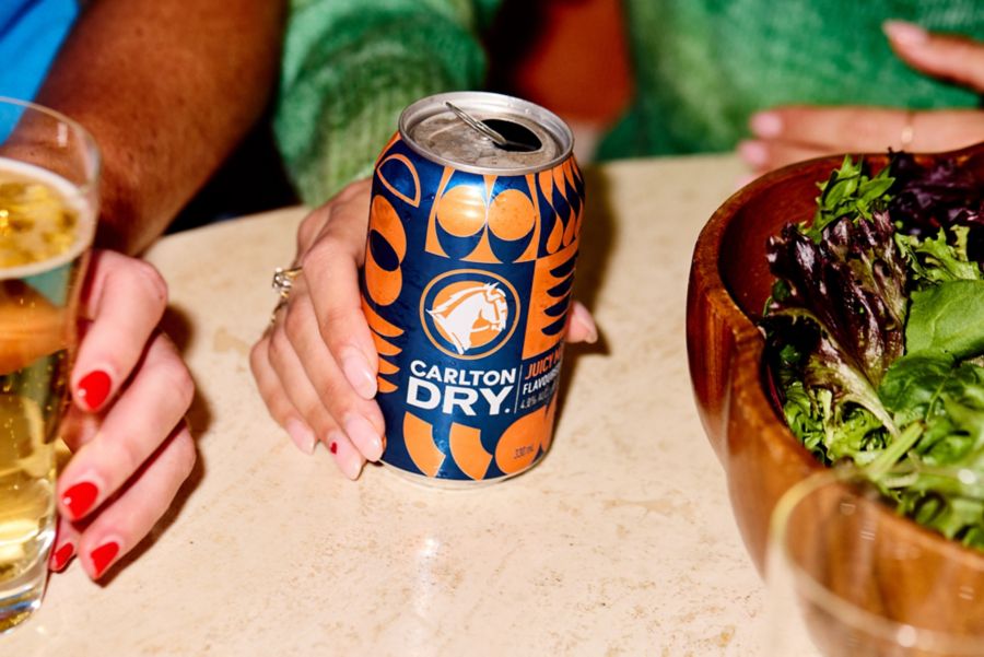 A can of Carlton Dry Juicy Mango Flavoured Beer