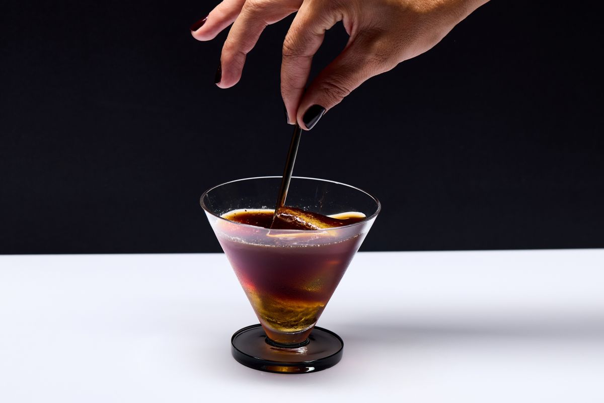 Ice block with grated coffee beans for Carajillo recipe