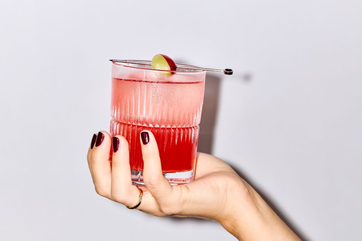 Holding the Enzoni cocktail