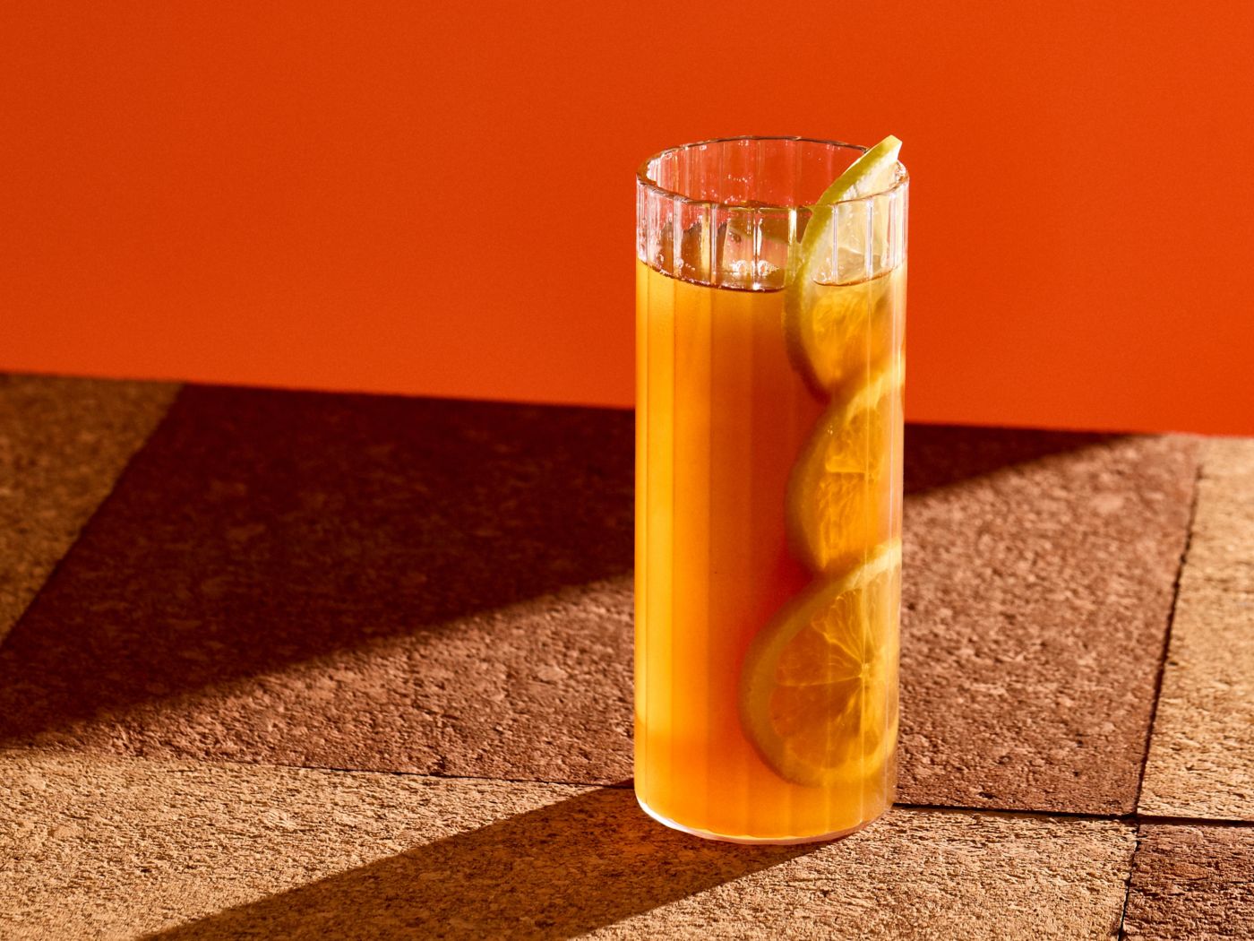 The Bourbon Peach Tea cocktail in a tall glass