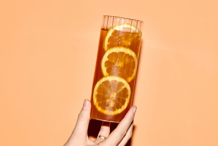 The Bourbon Peach Tea is a vibrant cocktail 