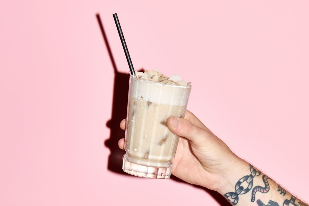 Holding the Coconut Tamaretto Sour cocktail