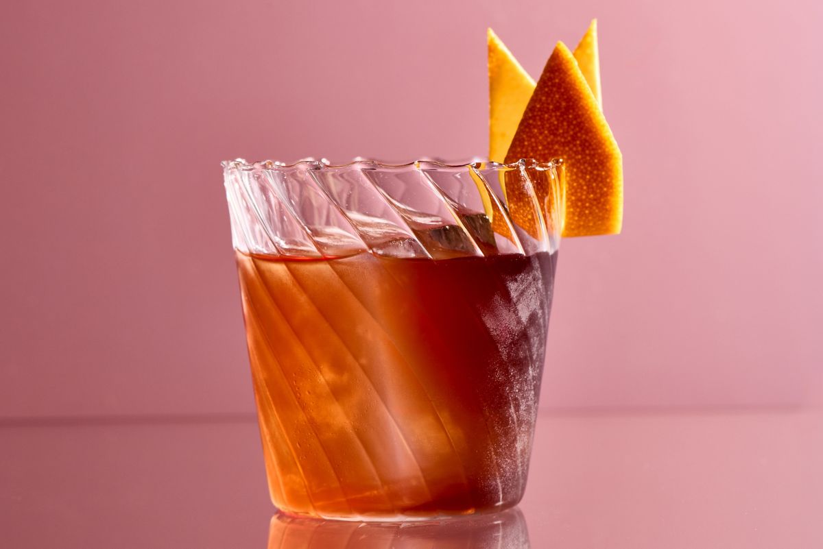 The Rabo de Galo cocktail, finished with an orange twist