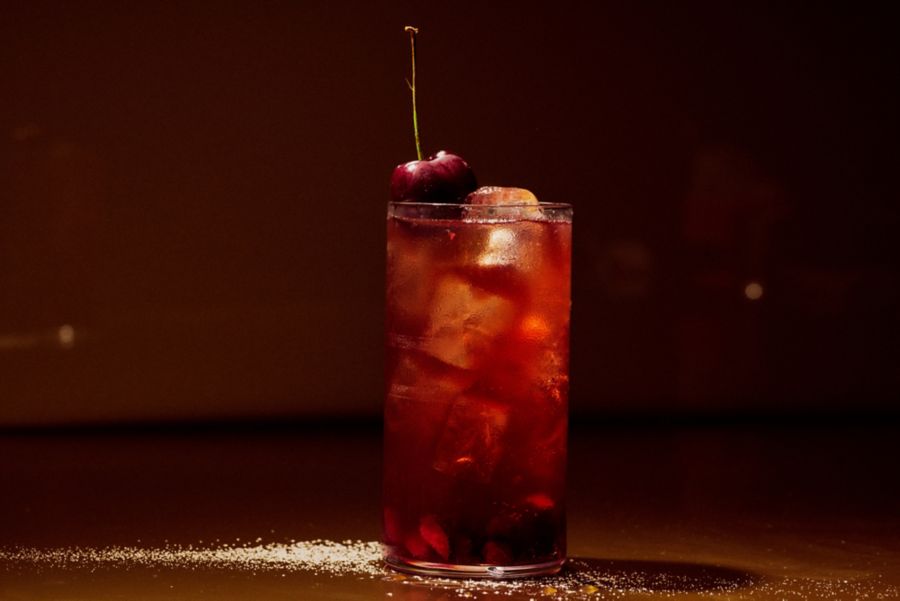The Bourbon Cherry Cola with a sugar-dusted cherry on top 