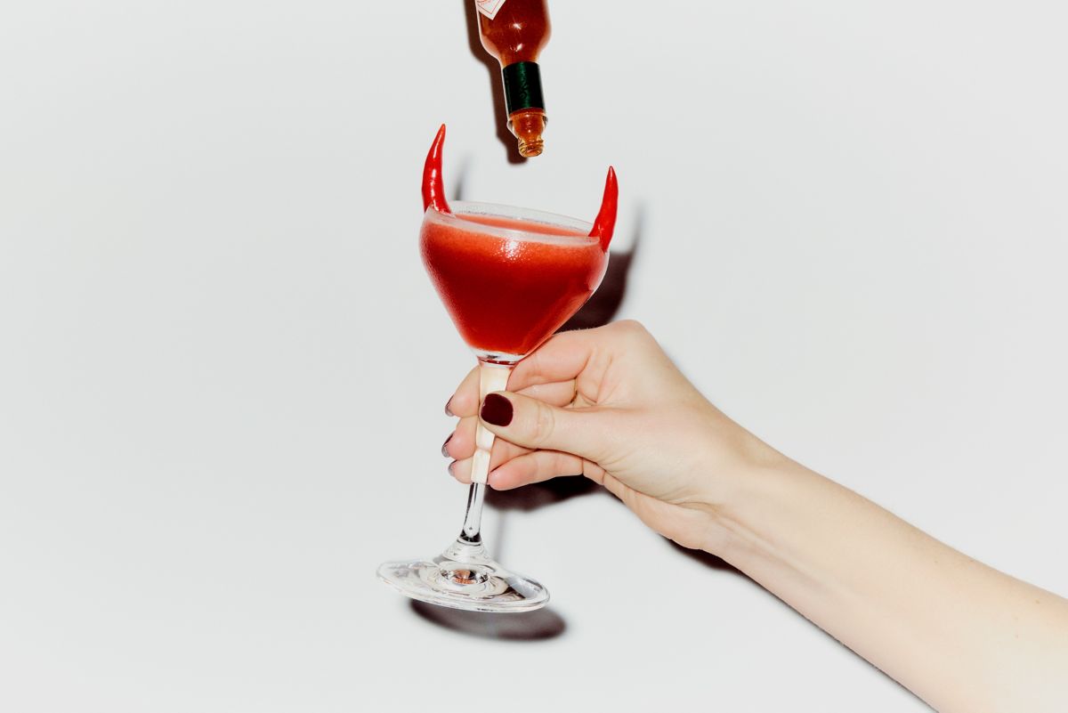Adding Tabasco to the Devil's Horn cocktail