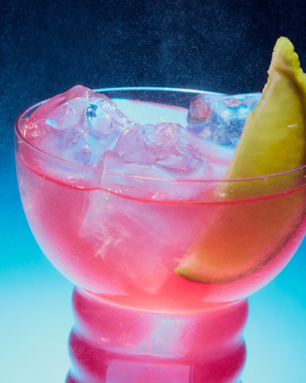 The simple Seabreeze cocktail is a refreshing mix, garnished with fresh lime 