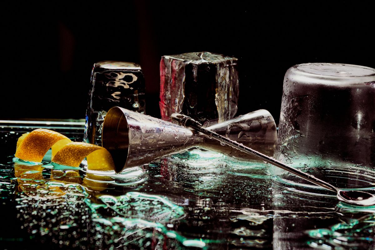 Cocktail mixing tools for Paper Plane cocktail recipe on ice 