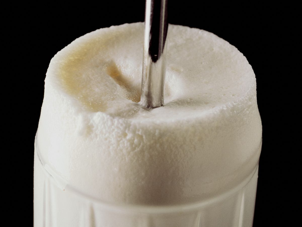 Two tall glasses of the Ramos Gin Fizz