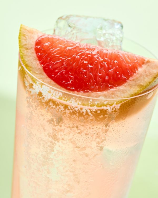 The Paloma is a vibrant pink cocktail made with tequila, lime and grapefruit soda  