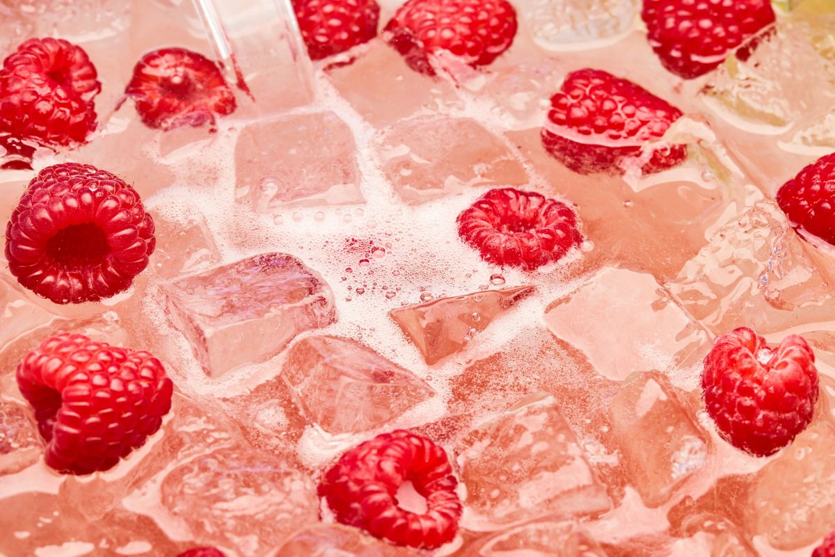 Looking into the Raspberry Tequila Sangria with raspberries floating on top 