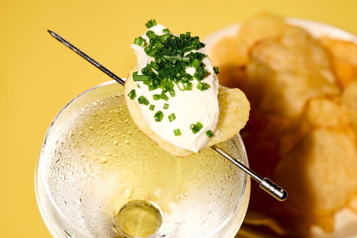 A close-up of the loaded chip garnish on the Salt & Vinegar Martini