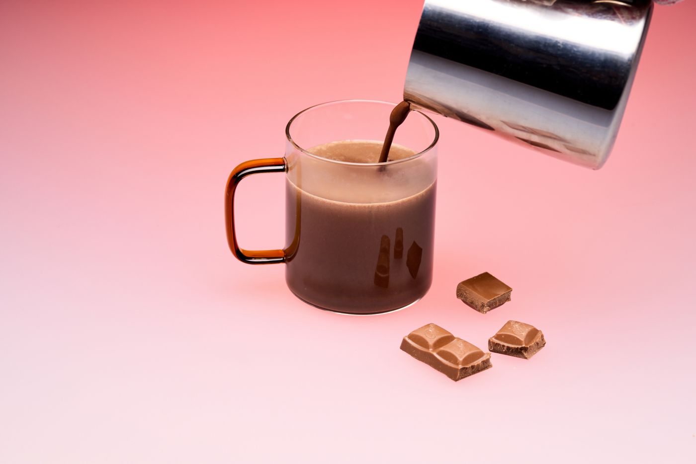 Pouring a Dan's Hot chocolate, which is spiked with vodka