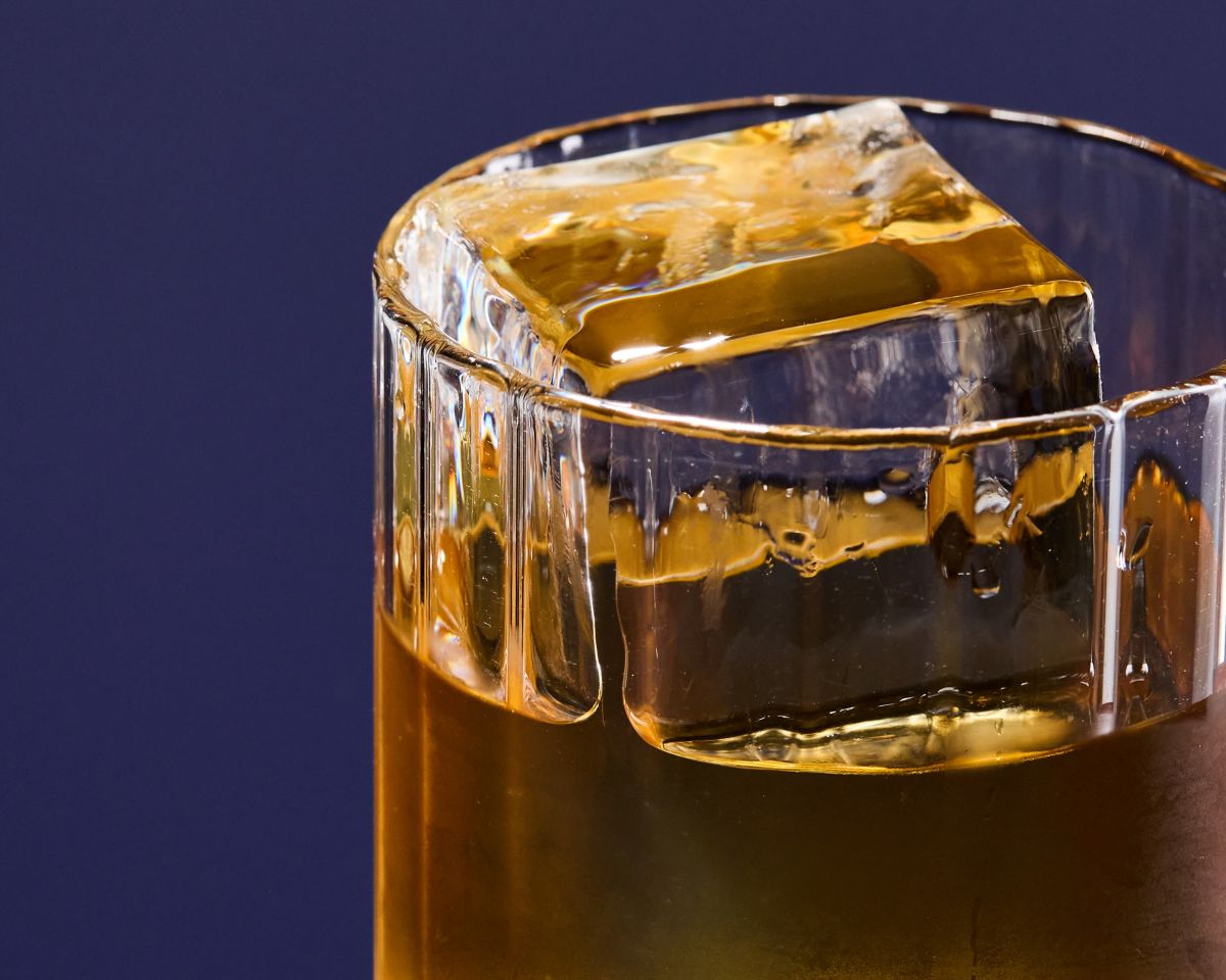 The Godfather cocktail with a large block of ice