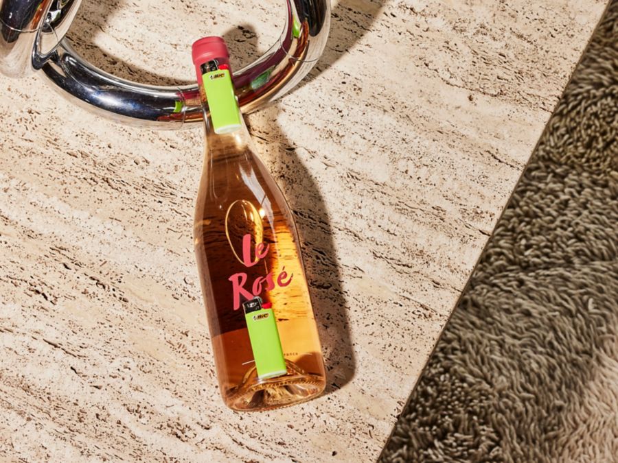 A bottle of rosé and a lighter