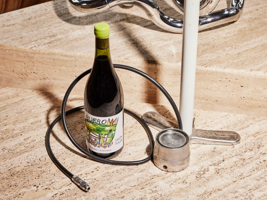 Bottle of wine and a bike pump