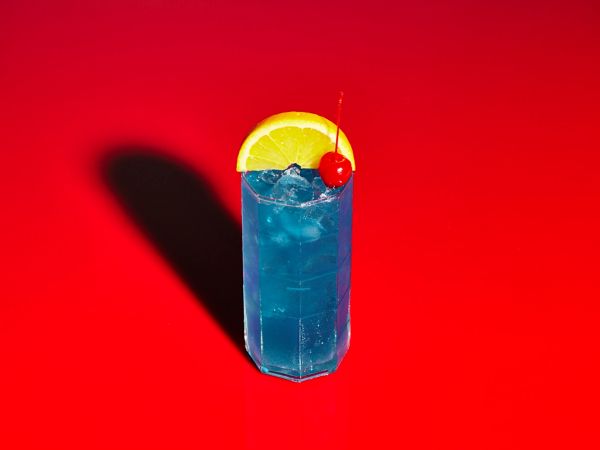  Here’s how this (often electric blue) liqueur should be served. 
