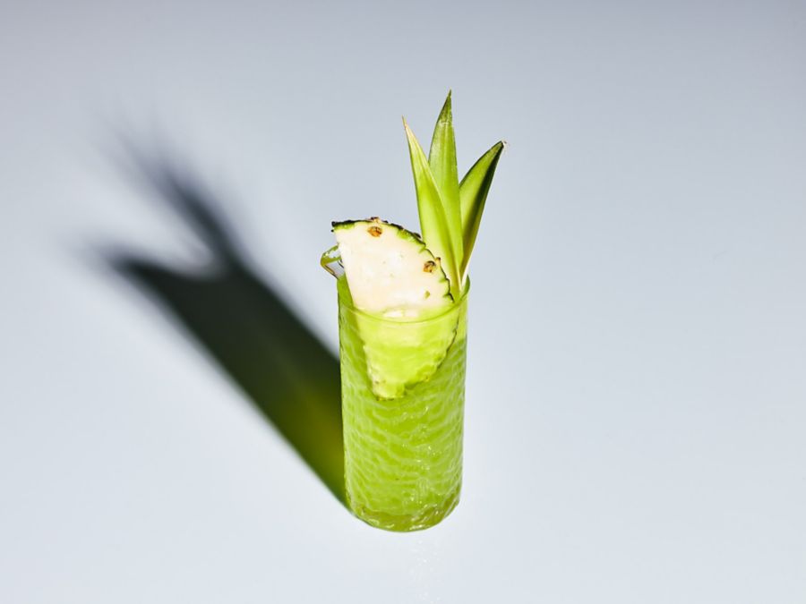 A highball of the Midori Illusion cocktail